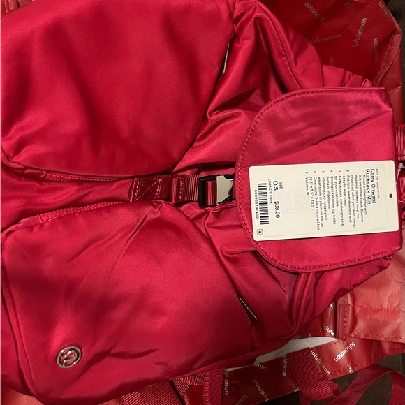 lululemon athletica Handbags - Fushia pink carry onward mini